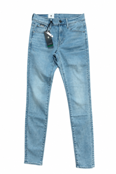 damskie spodnie skinny w kolorze niebieskim na białym tle